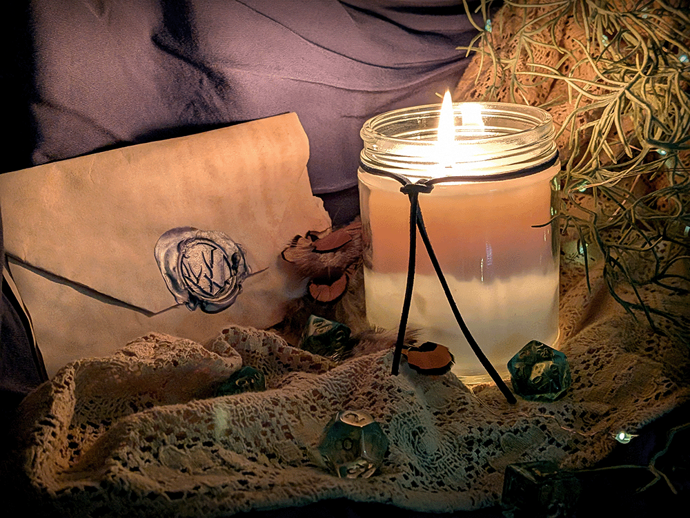 Candle in a glass jar with decorative elements on a cloth surface